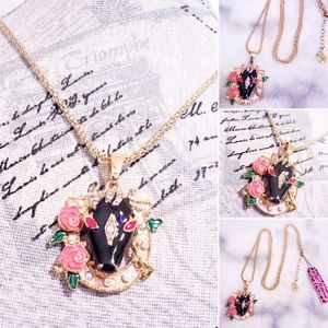 Crystal Gold horseshoe pink flower black horse nec
